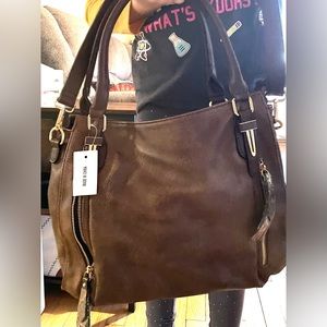 Brand new brown bag/purse. In perfect condition.